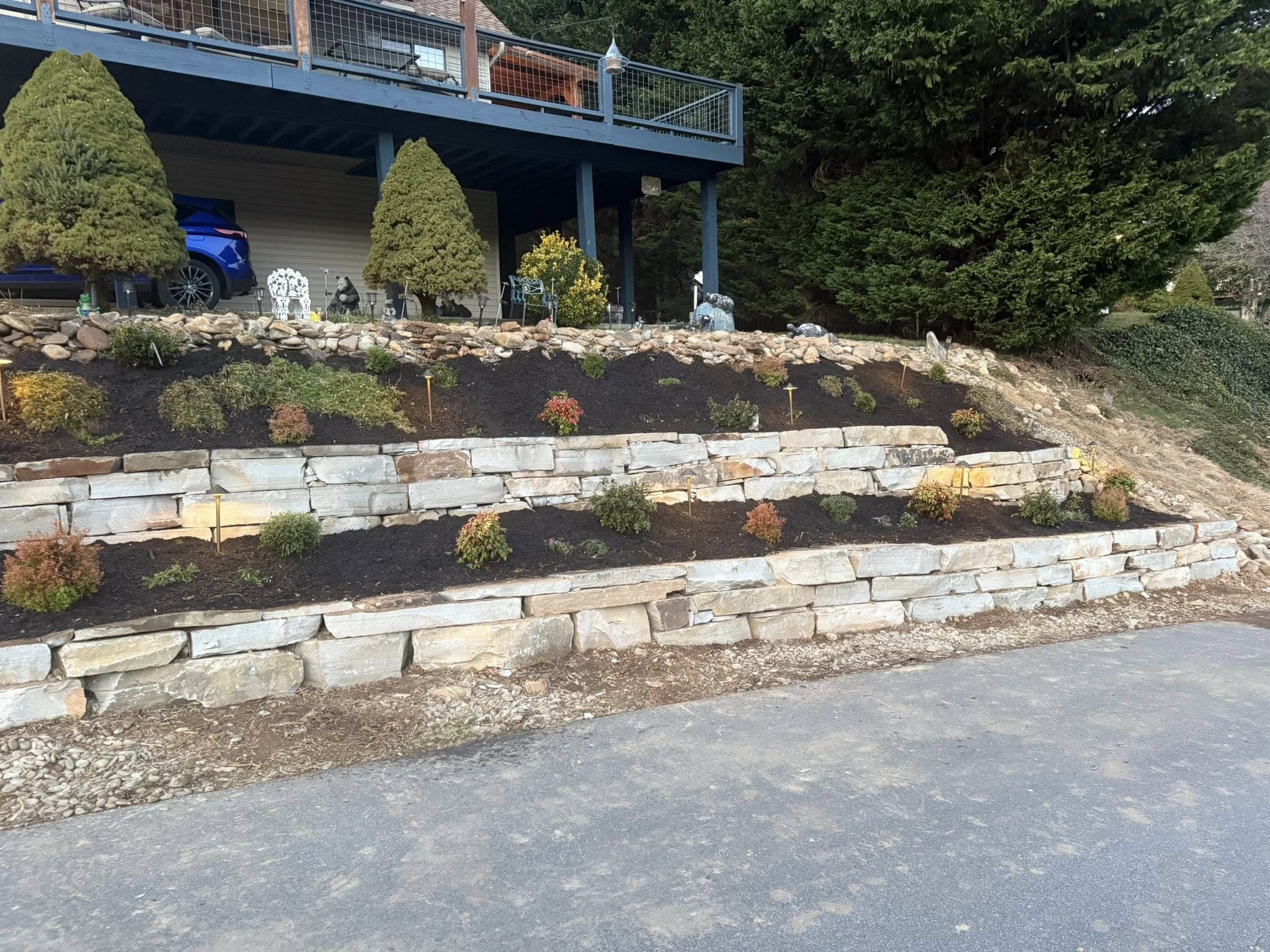Tiered landscaping and stone retaining walls