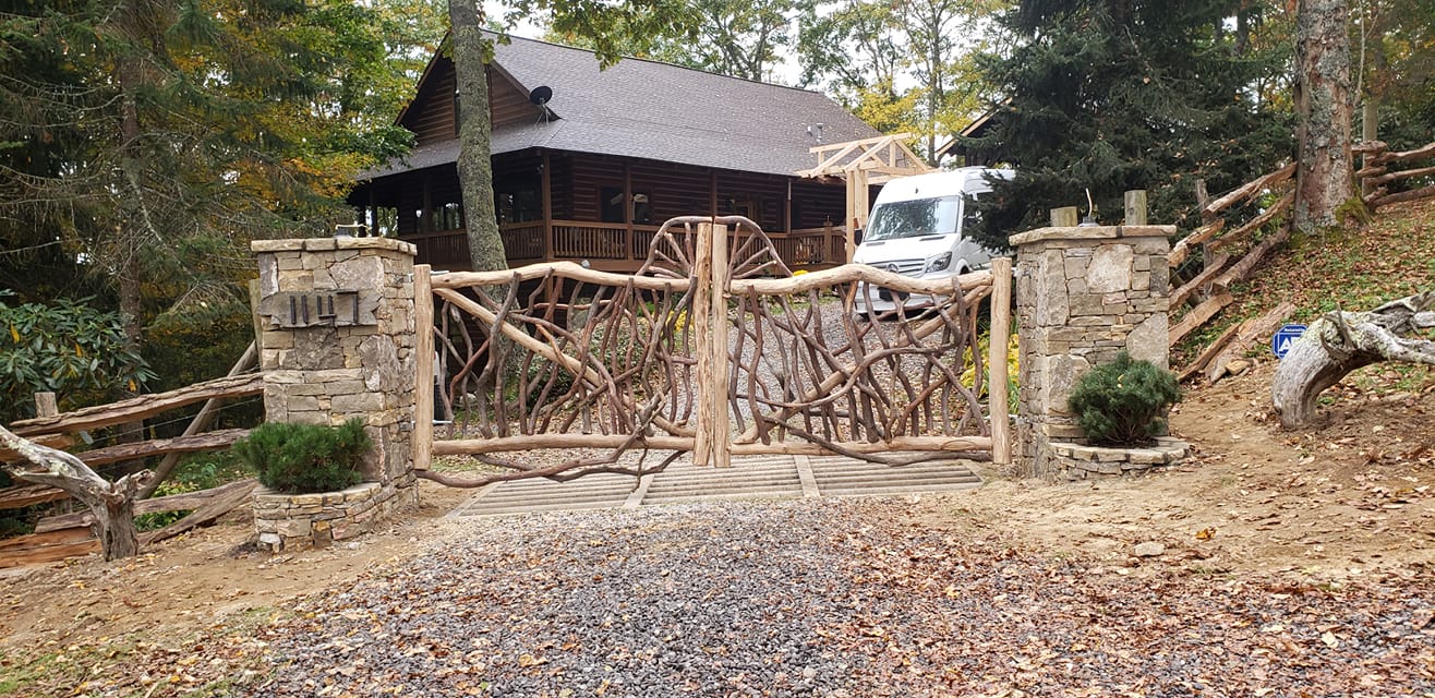 Custom entry gate, lighting and stonework